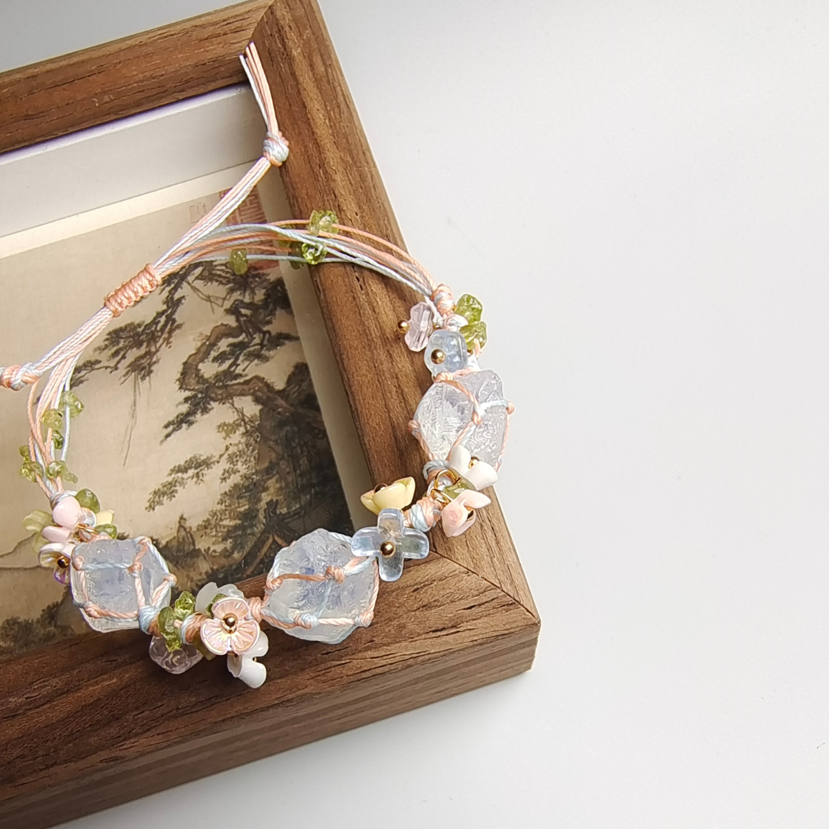Close-up of opal wire-wrapped bracelet