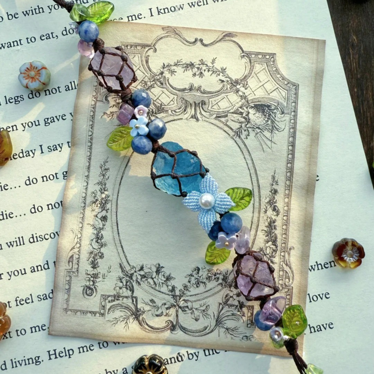 Close-up of raw aquamarine and amethyst crystal bracelet