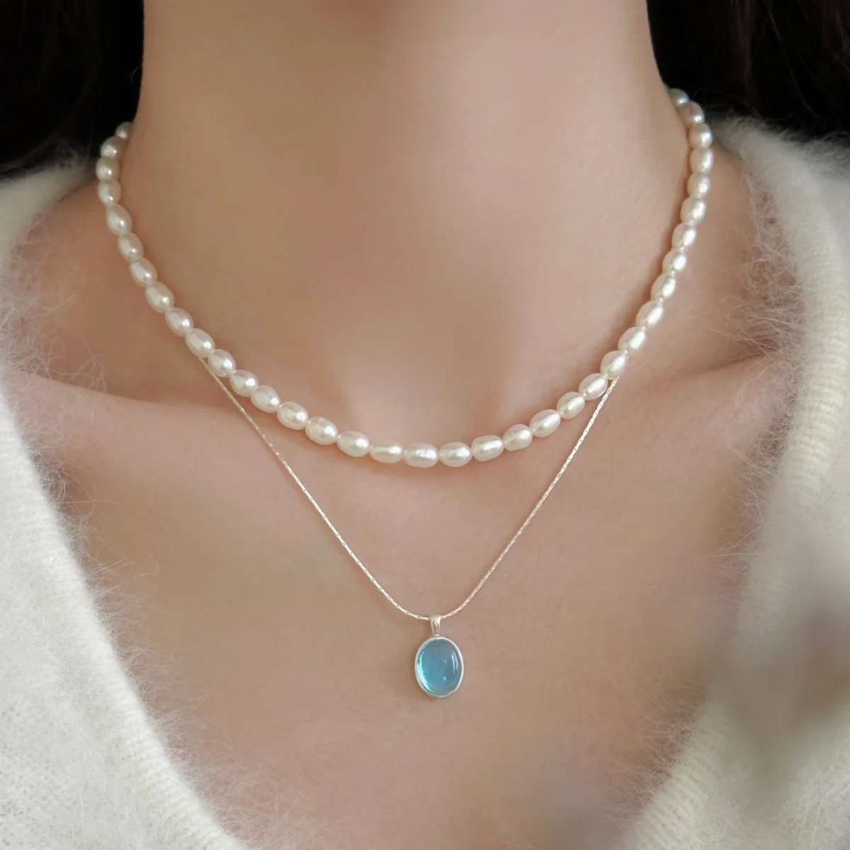 Layered aquamarine and pearl necklaces