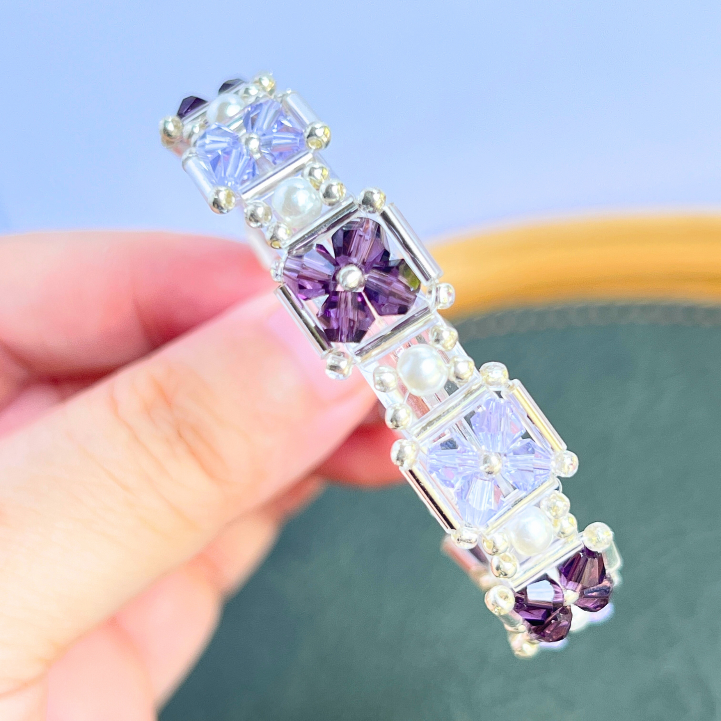 Full view of handmade grape purple beaded bracelet