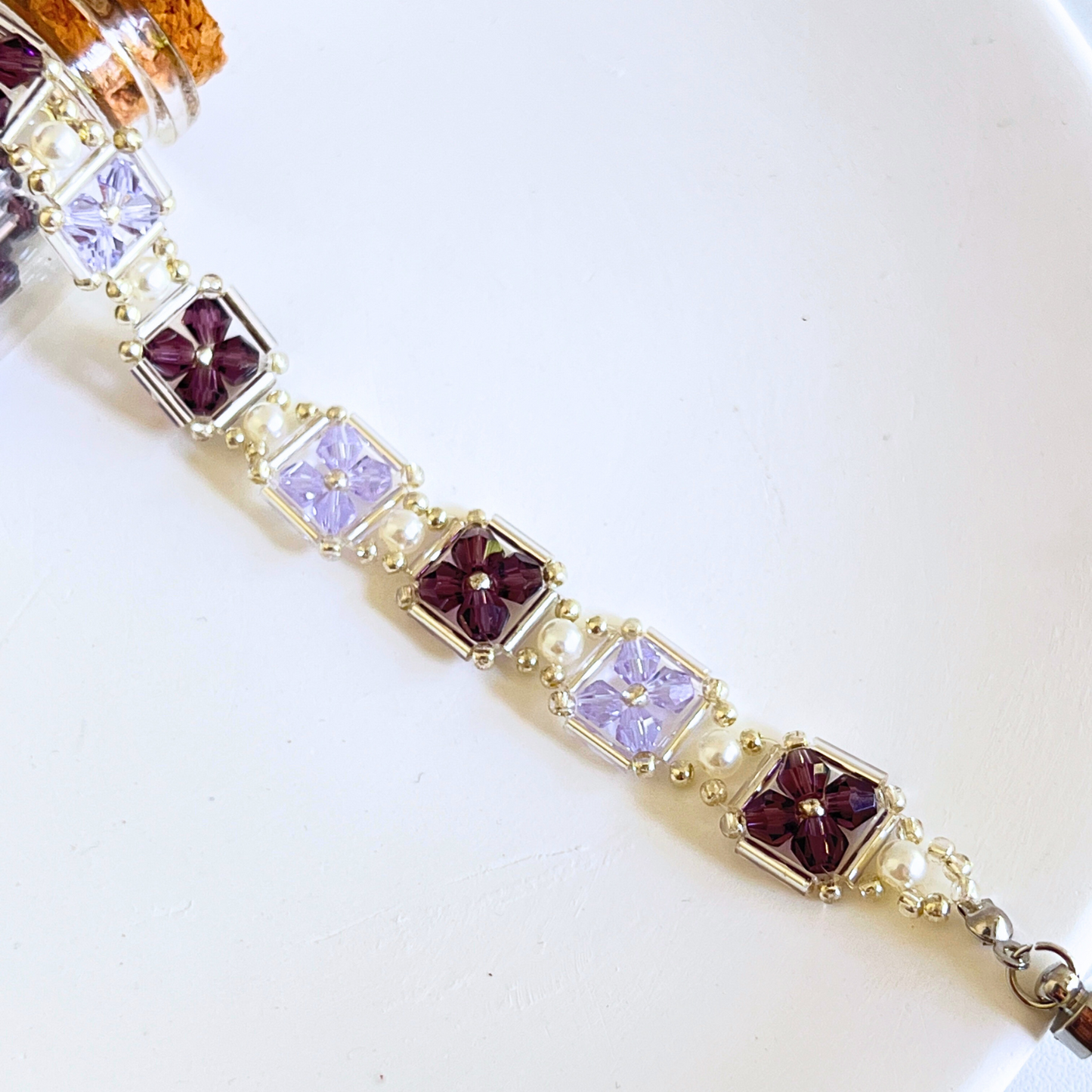 Handmade beaded bracelet close-up in grape purple