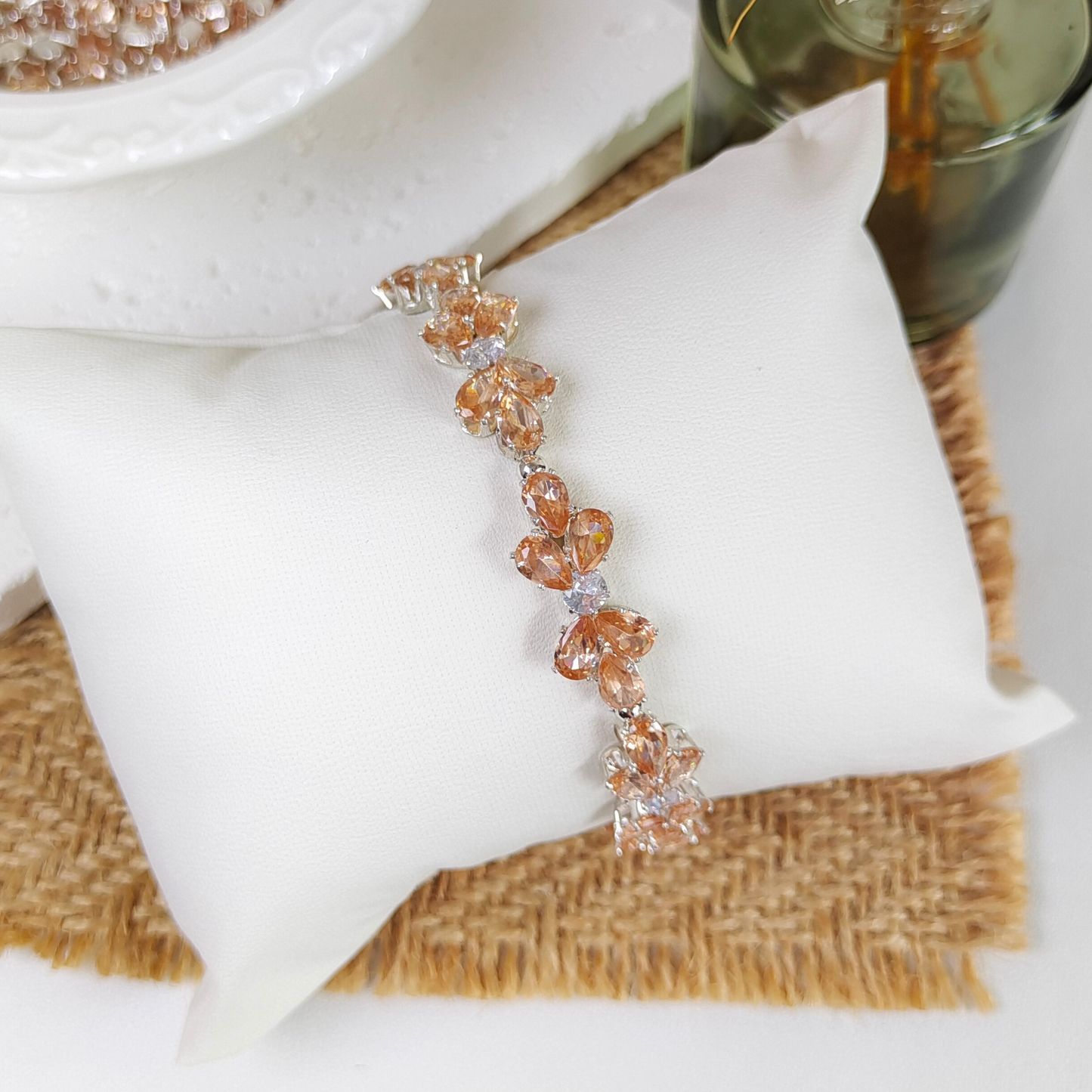 Handmade bracelet with amber teardrop zircon and white round crystals