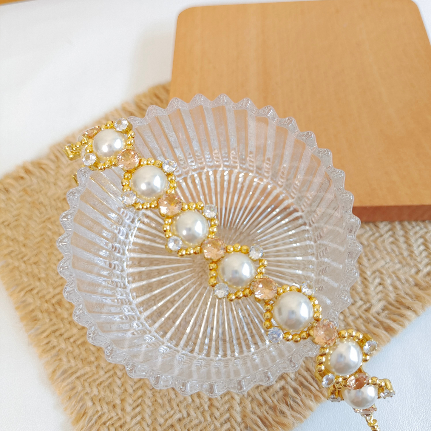 Close-up of LinaBell clasp with glossy white pearls