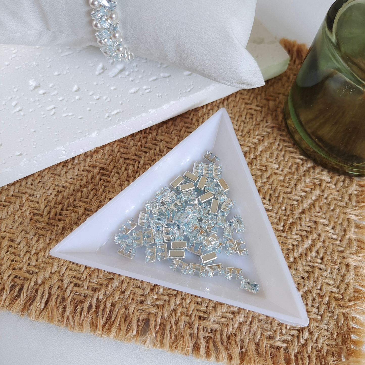 Icy blue rectangular zircon rhinestone with silver claw setting