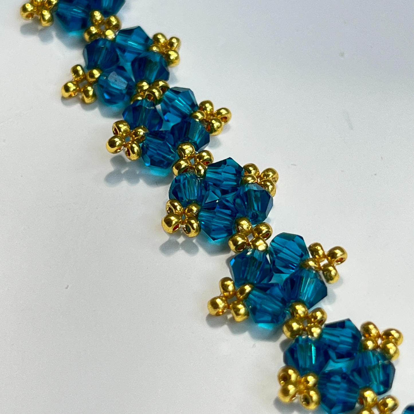 Navy blue bead bracelet close-up highlighting rich navy tones and artisanal stringing