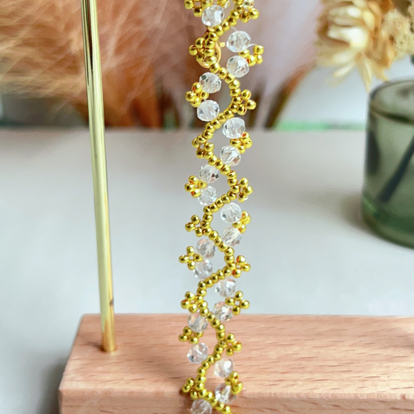 Minimalist bracelet with clear flat wheel beads – close-up product image for detail view