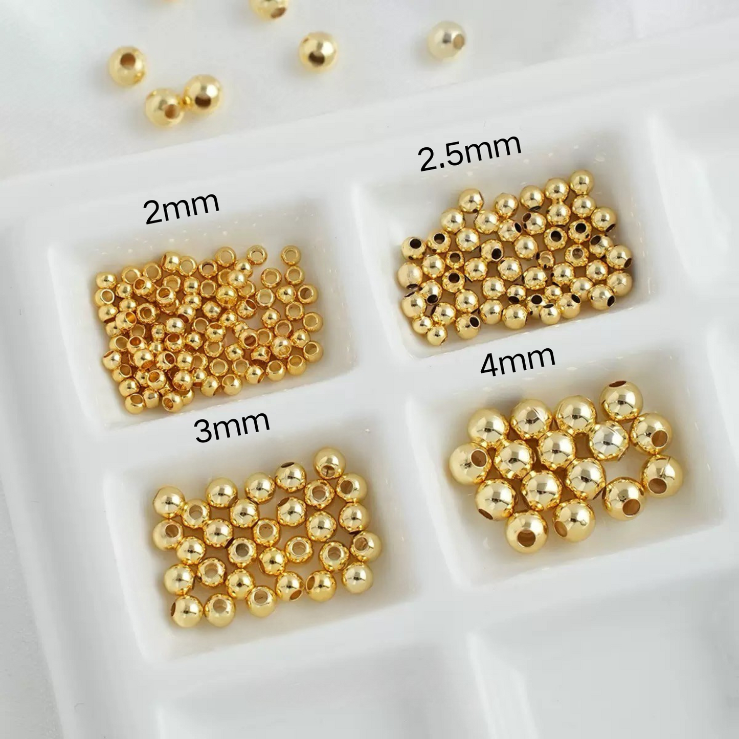 Gold seed beads in four different sizes for versatile jewelry making