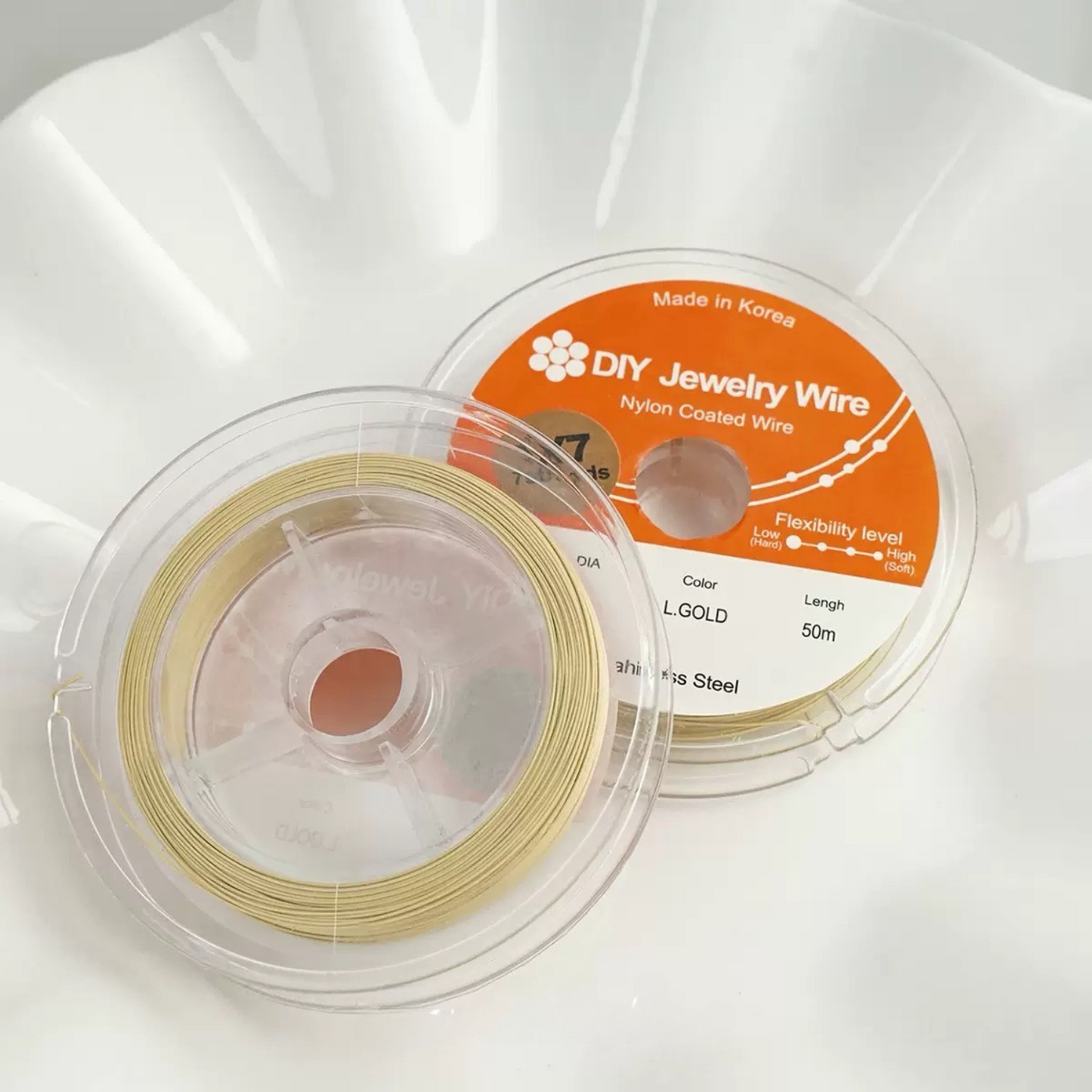 Double-sided display of light gold beading wire for DIY jewelry