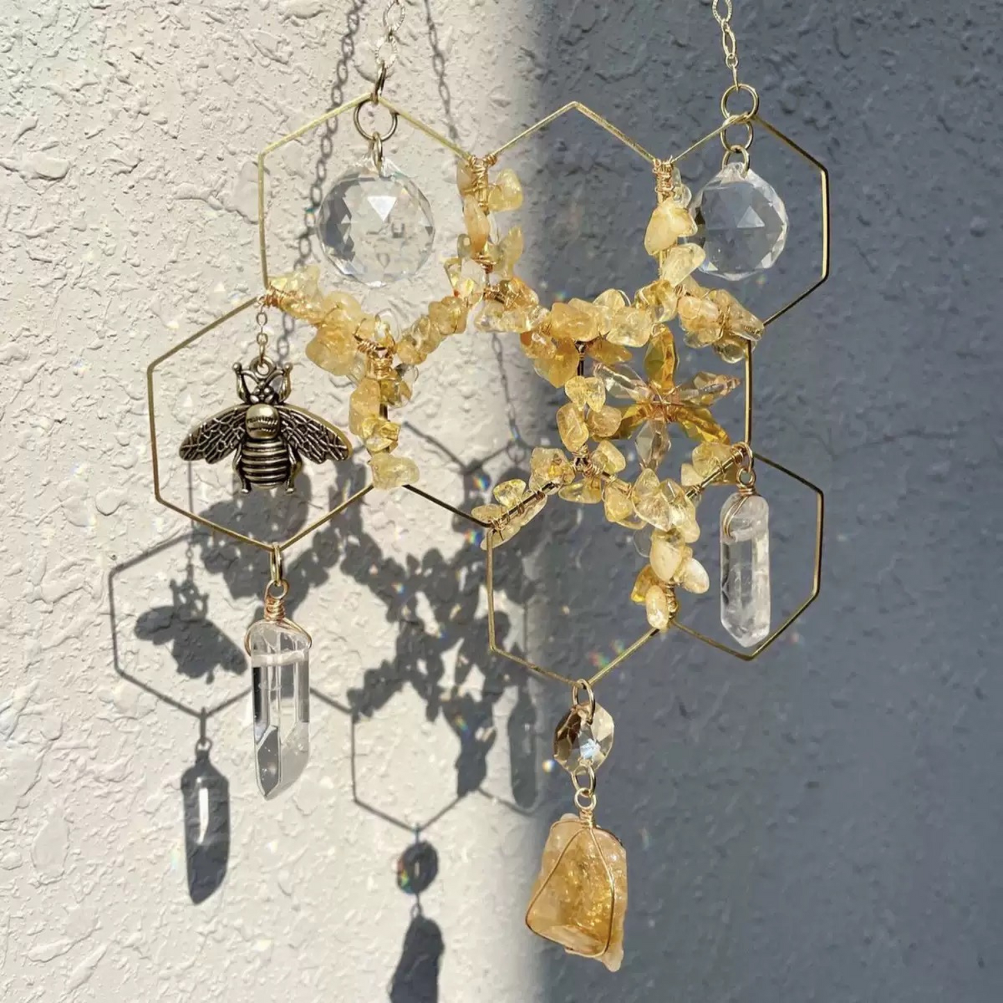 Golden citrine suncatcher in sunlight