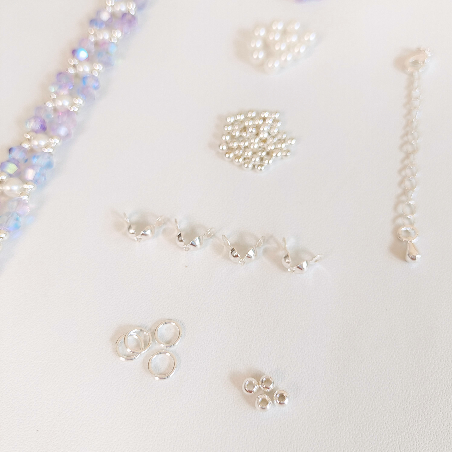Jewelry-making supplies: aurora purple crystals and findings