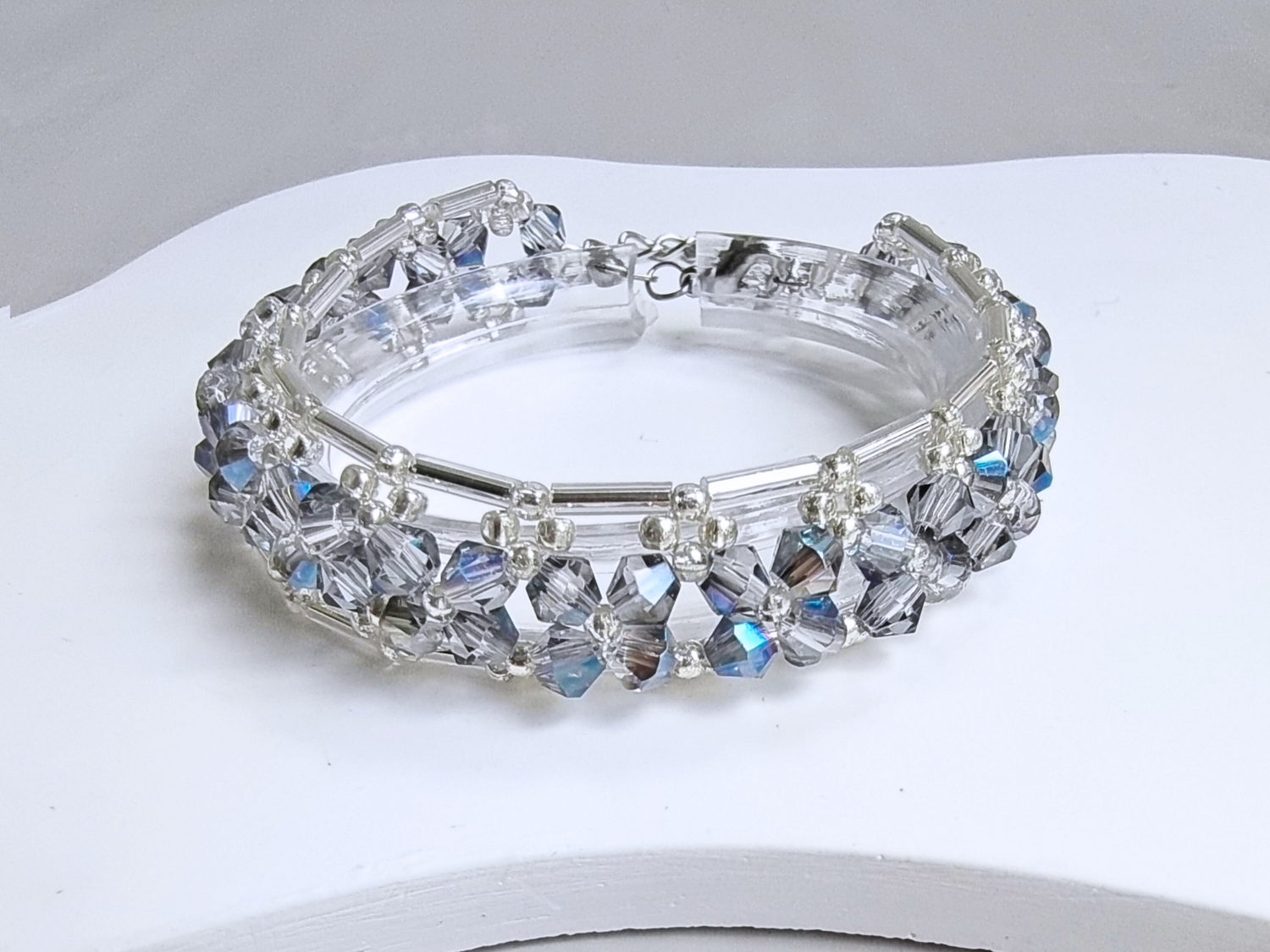 Full view of blue-grey beaded bracelet