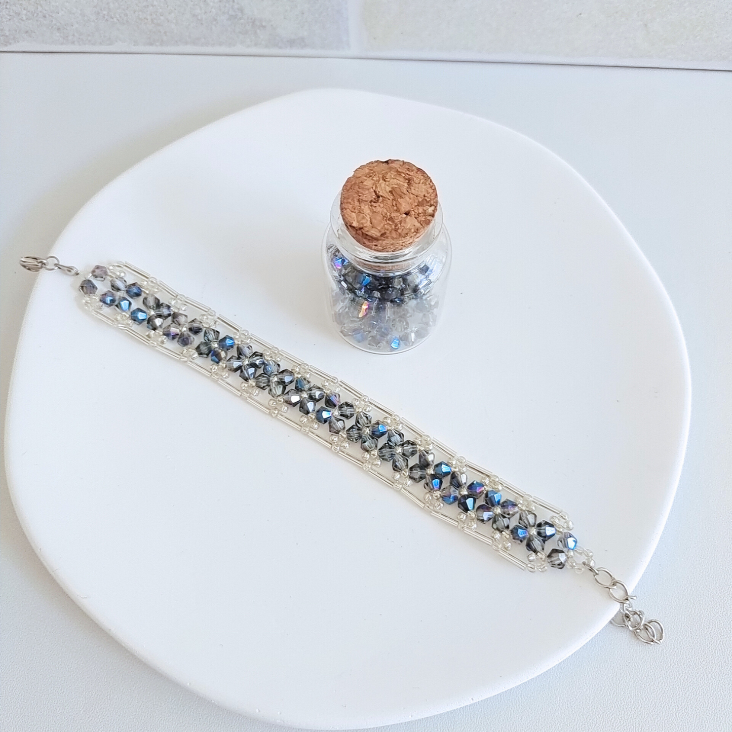 Blue-grey diamond beads bracelet in full view,