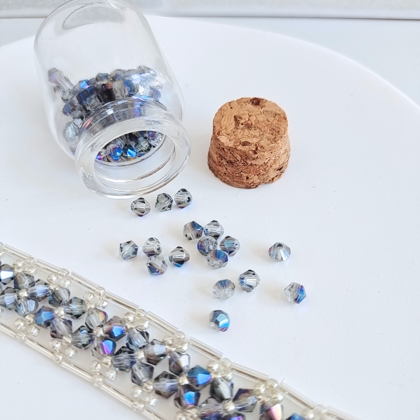 Close-up of blue-grey diamond beads bracelet showcasing bead texture