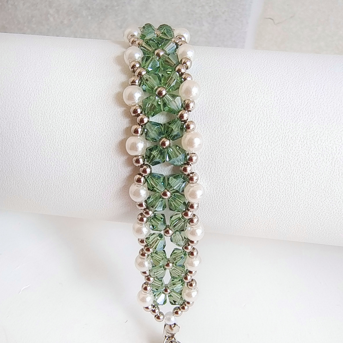 Detailed shot of gray-green diamond beads bracelet