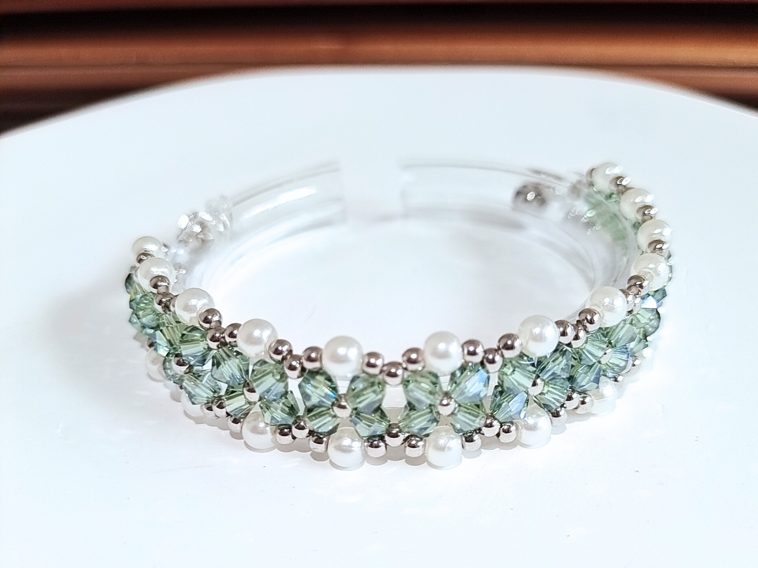 Full view of handmade gray-green diamond beads bracelet