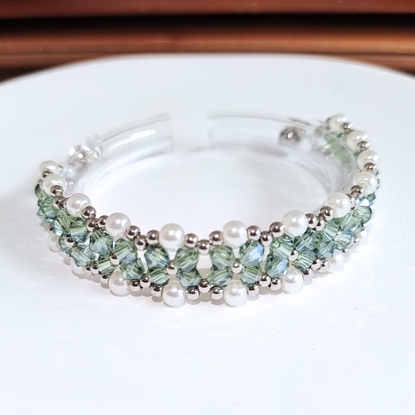 Full view of gray-green diamond beads bracelet