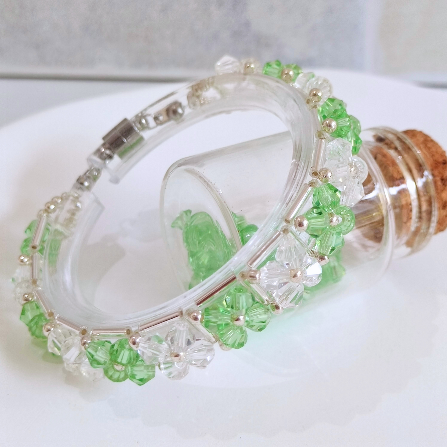 Summer-inspired bracelet with green and clear diamond beads