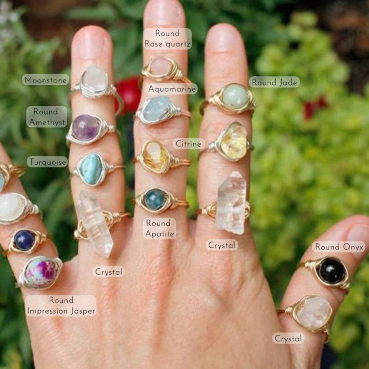 Raw crystal rings worn on fingers