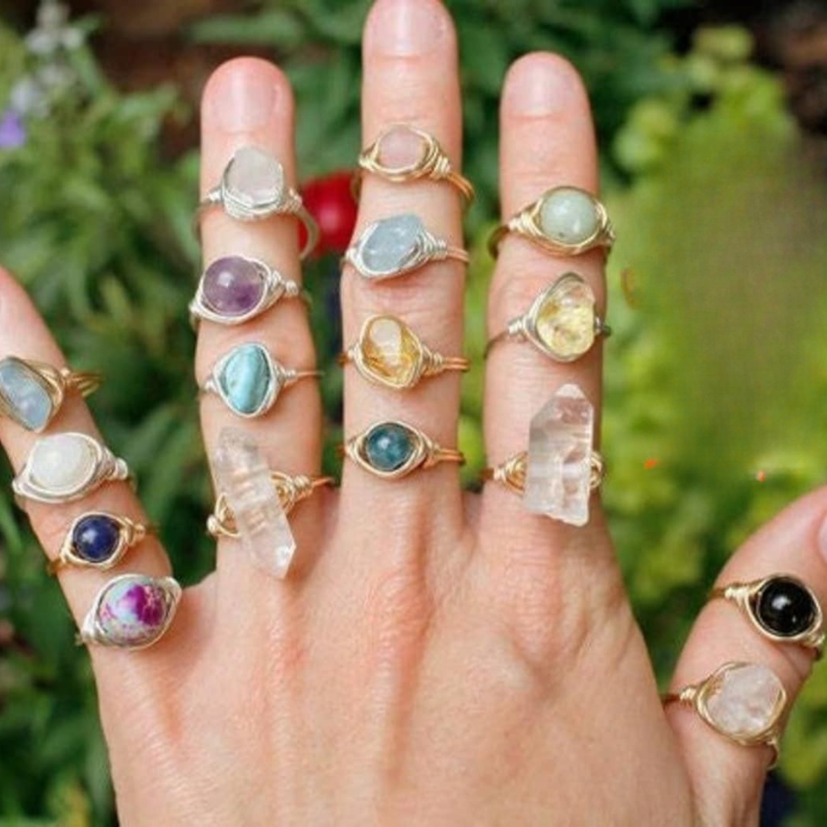 Handmade raw crystal rings worn on hand