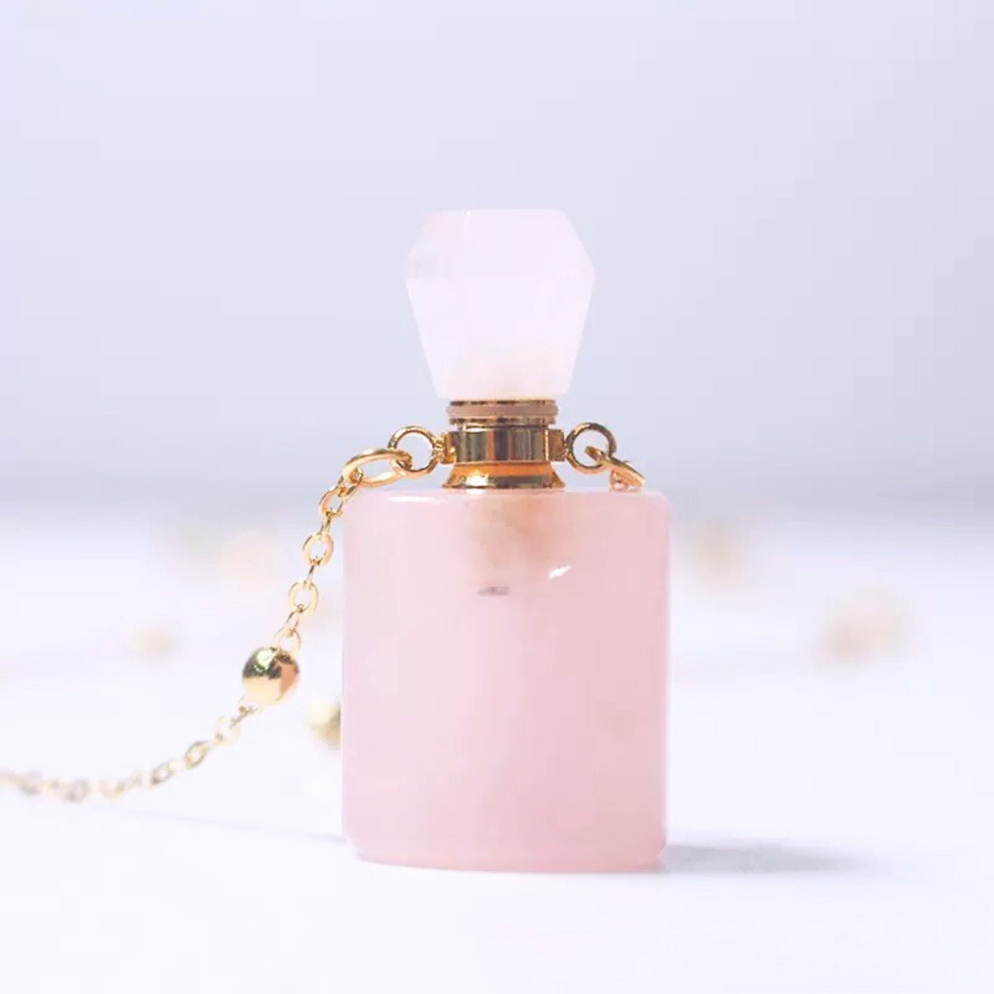 Close-up of crystal bottle pendant