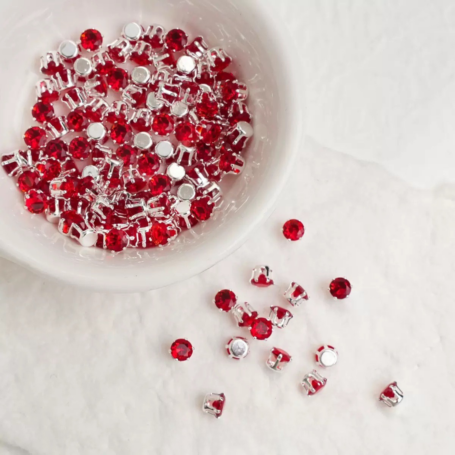 red claw-set zirconia stones