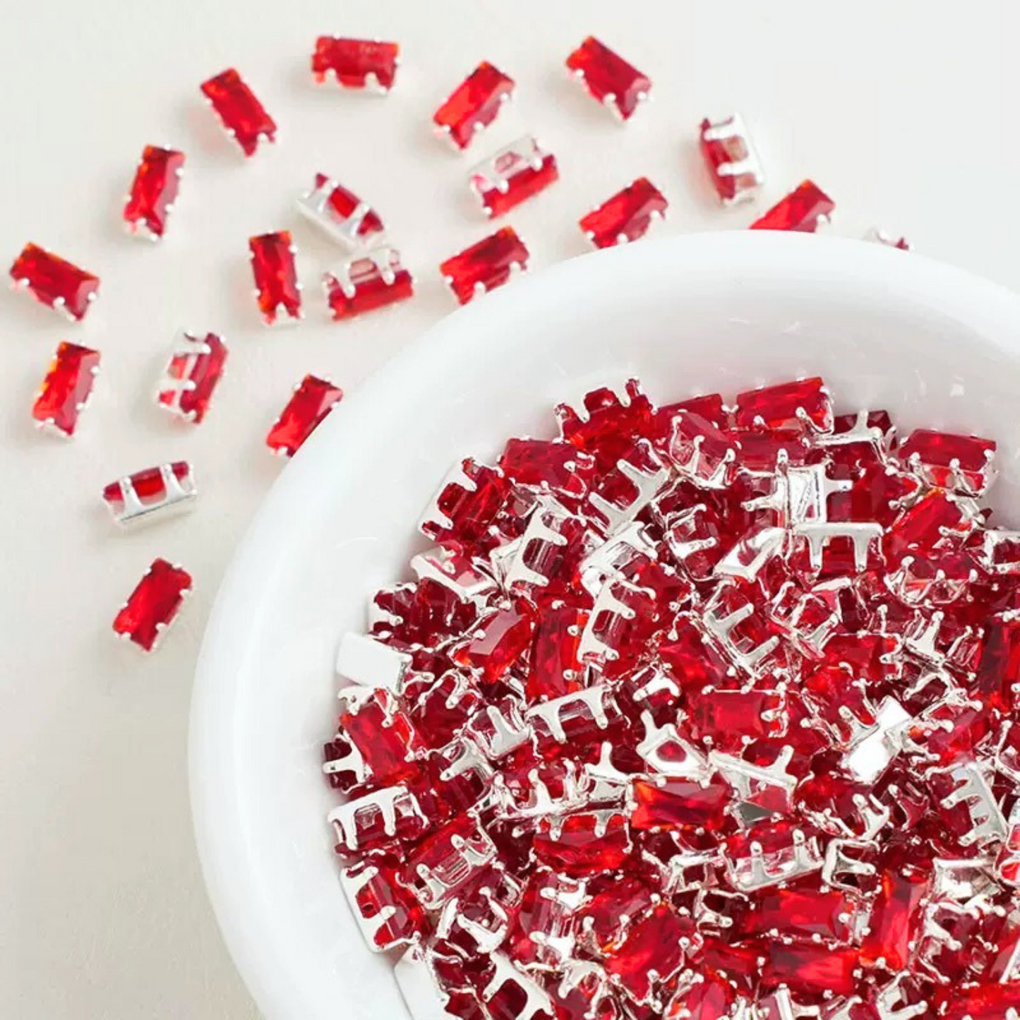 Rectangular cubic zirconia gems in red