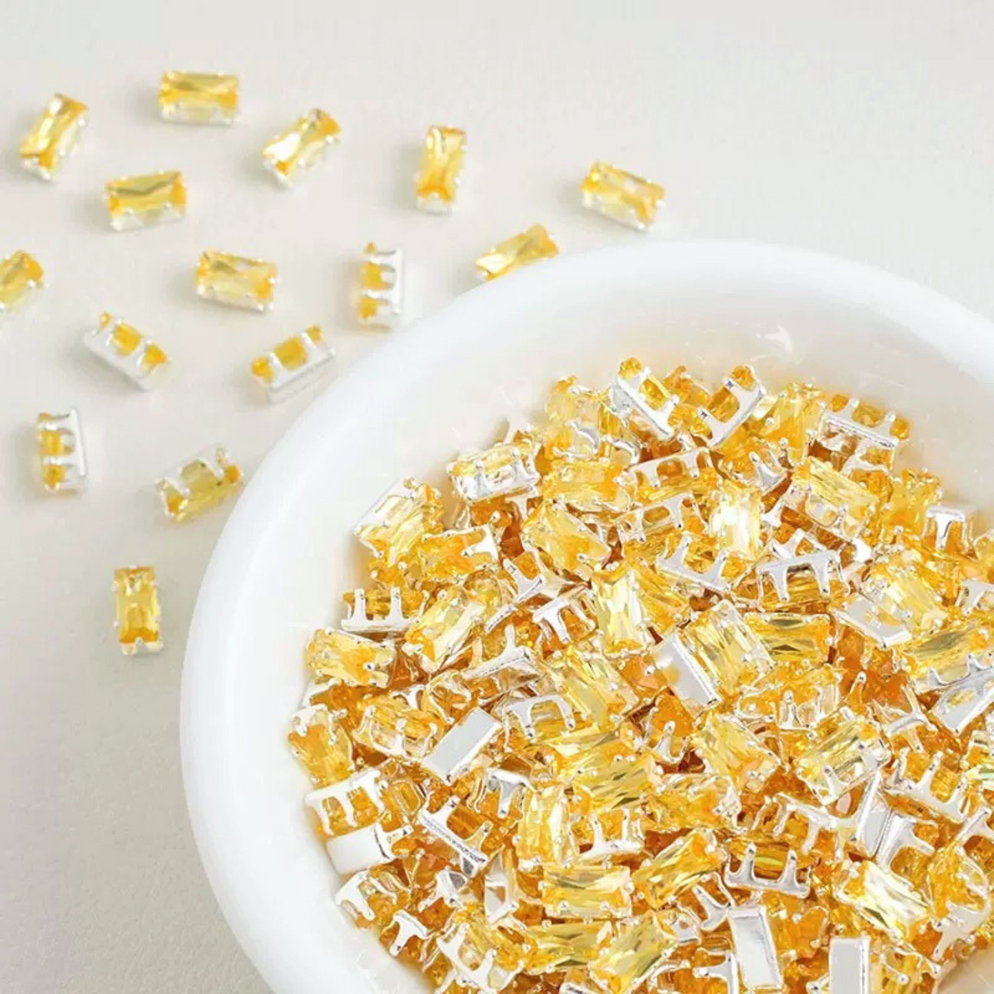 Rectangular cubic zirconia gems in yellow
