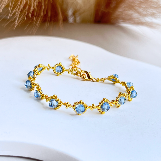 Full view of sky blue beaded bracelet