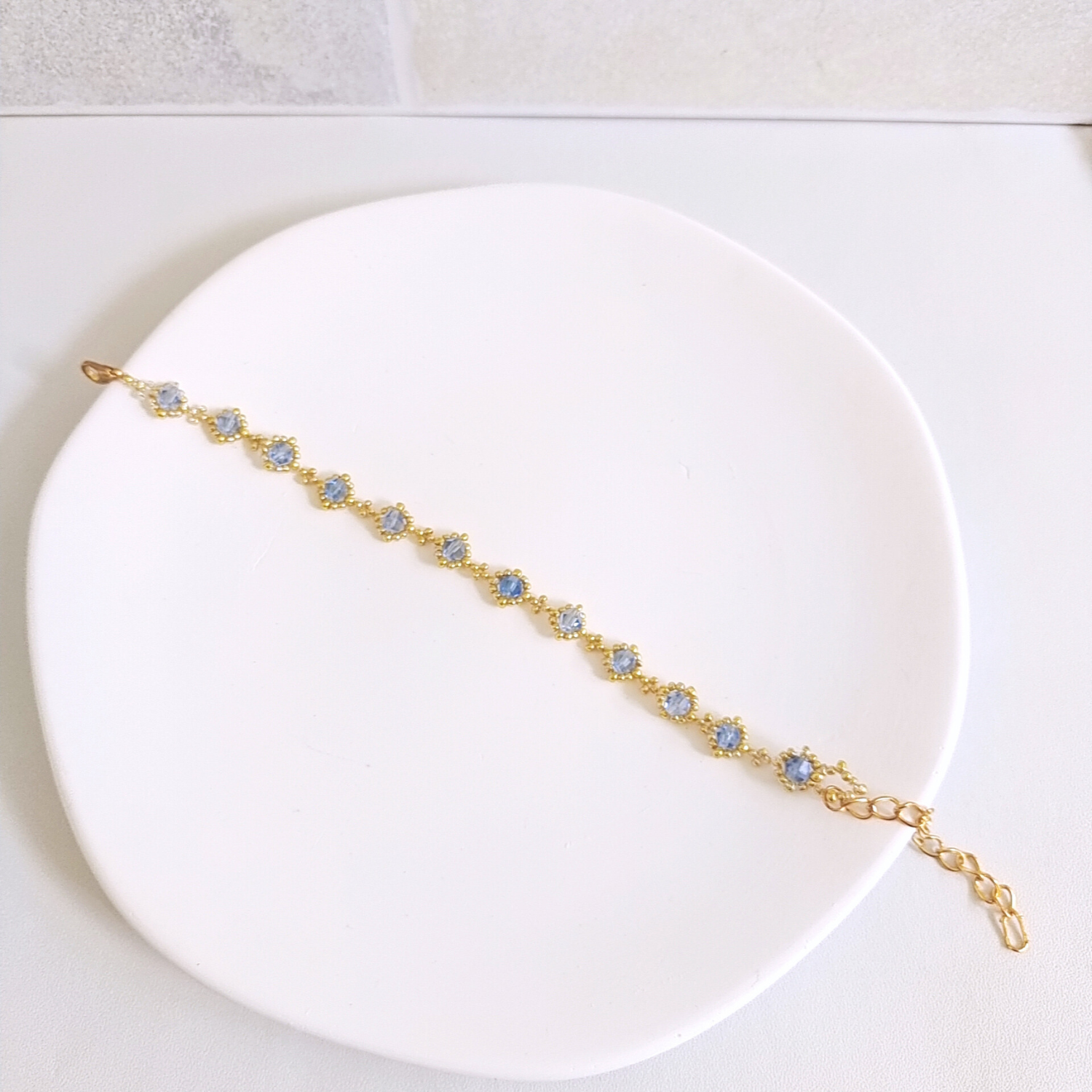 Handmade sky blue beaded bracelet – full display highlighting soft colors and minimalist style