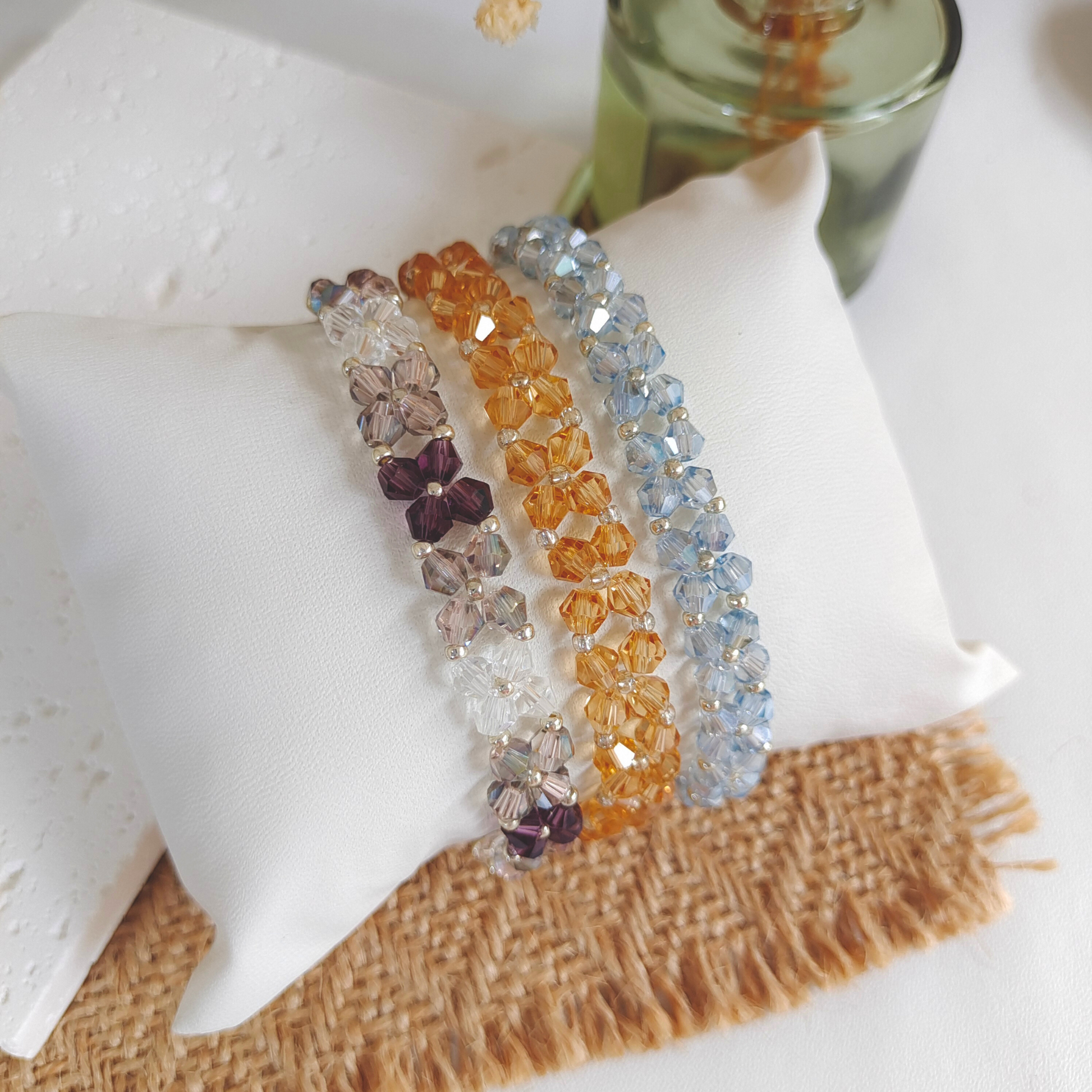 Crystal bicone bead bracelet with a light-reflecting finish