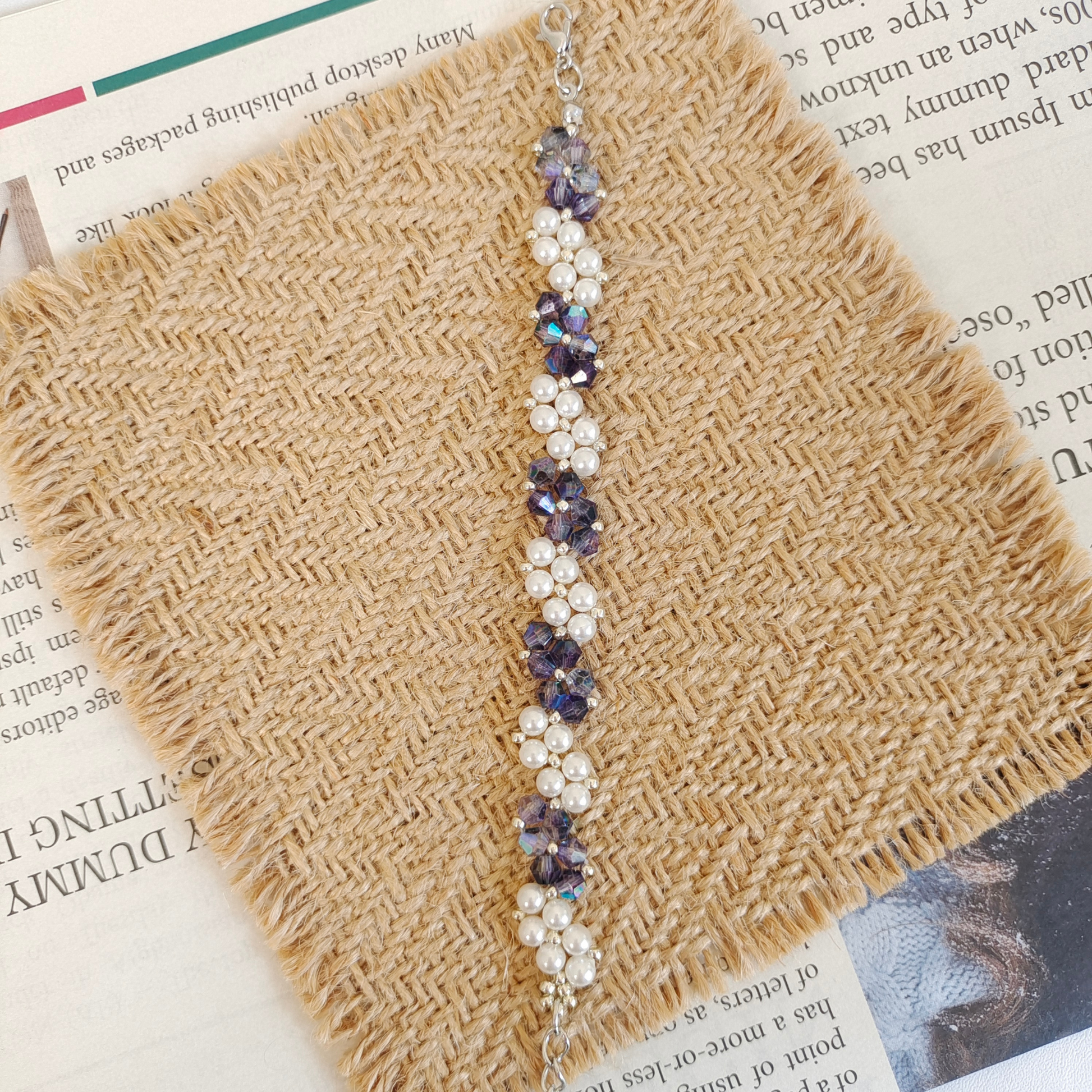 DIY bracelet with dark blue diamond beads and pearls