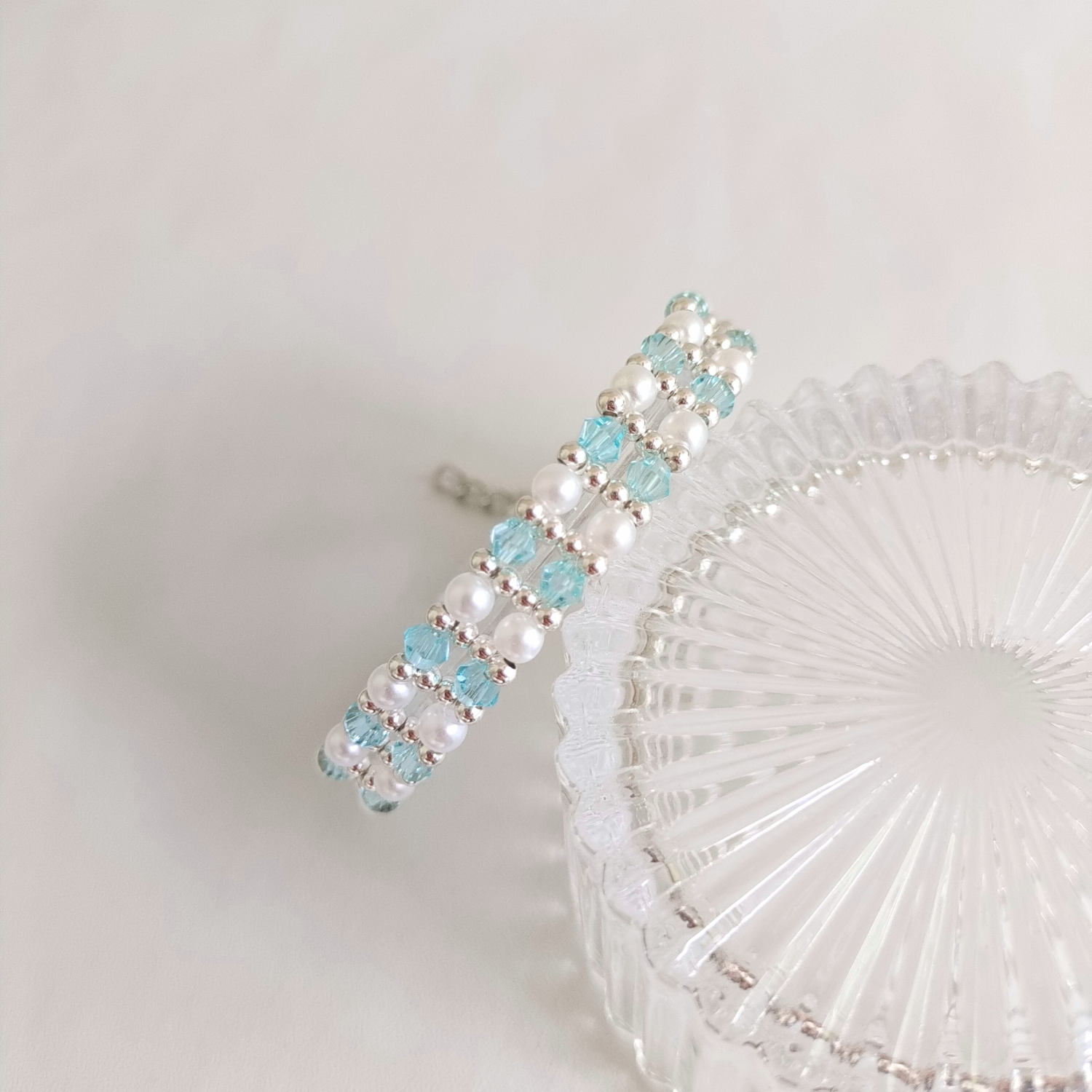 Handmade bracelet with icy blue crystal diamond beads and pearls