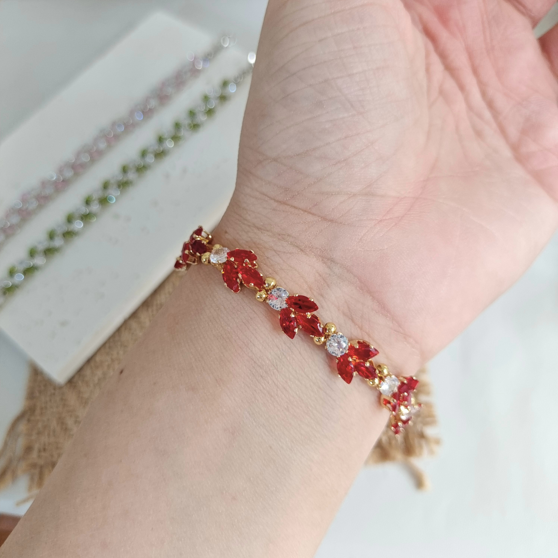 rist view of handmade bracelet with koi fish zircon charm