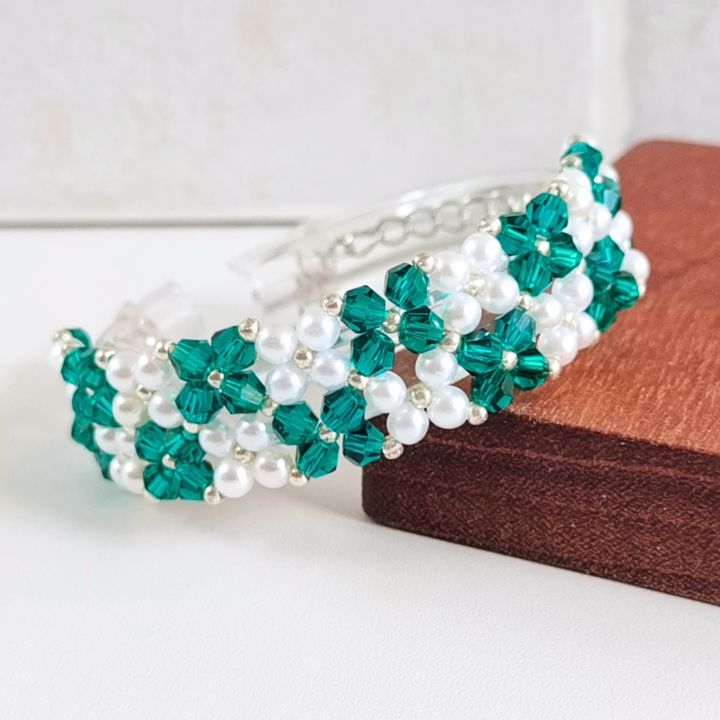 Peacock green beaded bracelet close-up