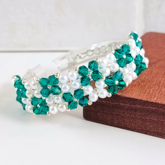 Peacock green beaded bracelet close-up