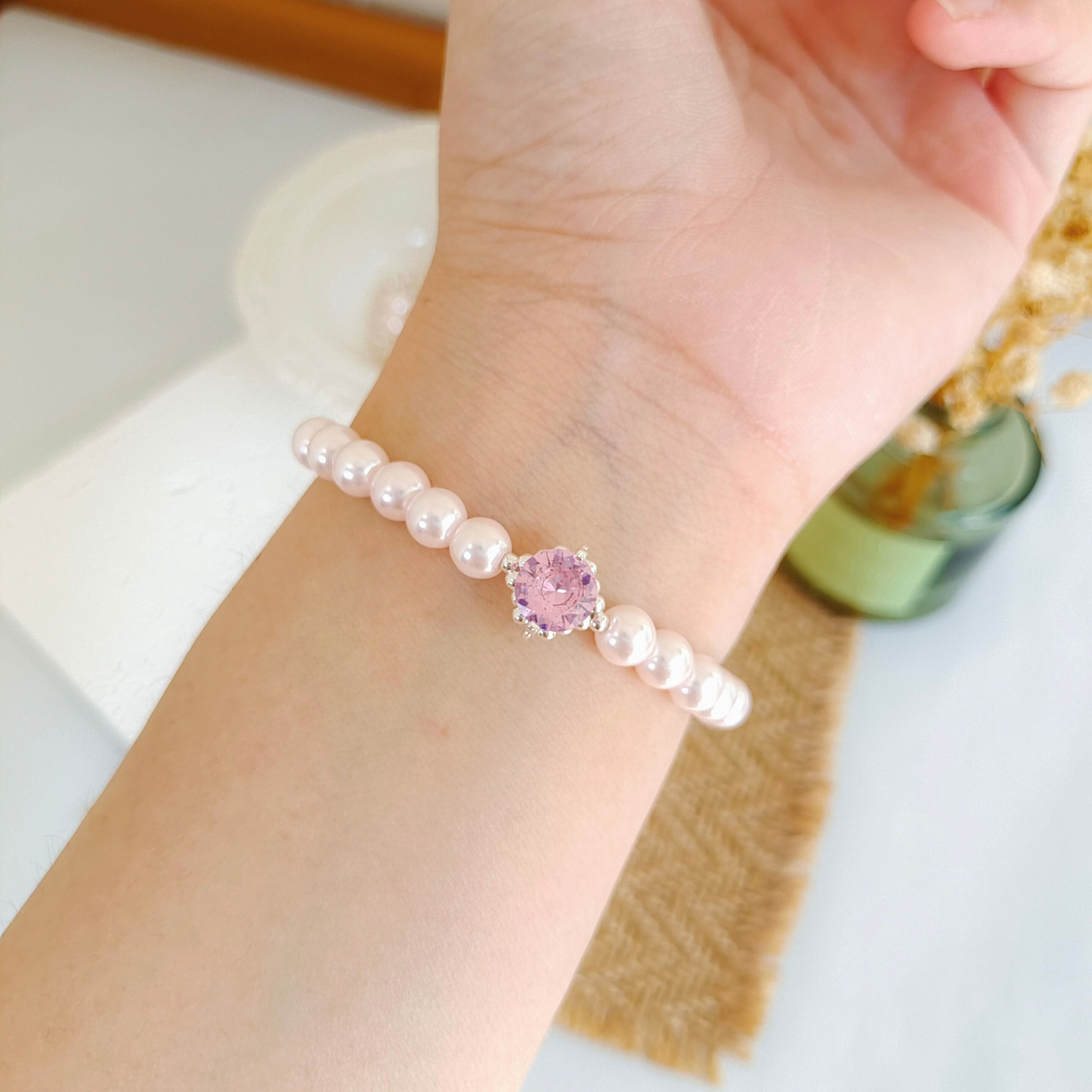 Elegant pink pearl and rhinestone bracelet in real-life wear