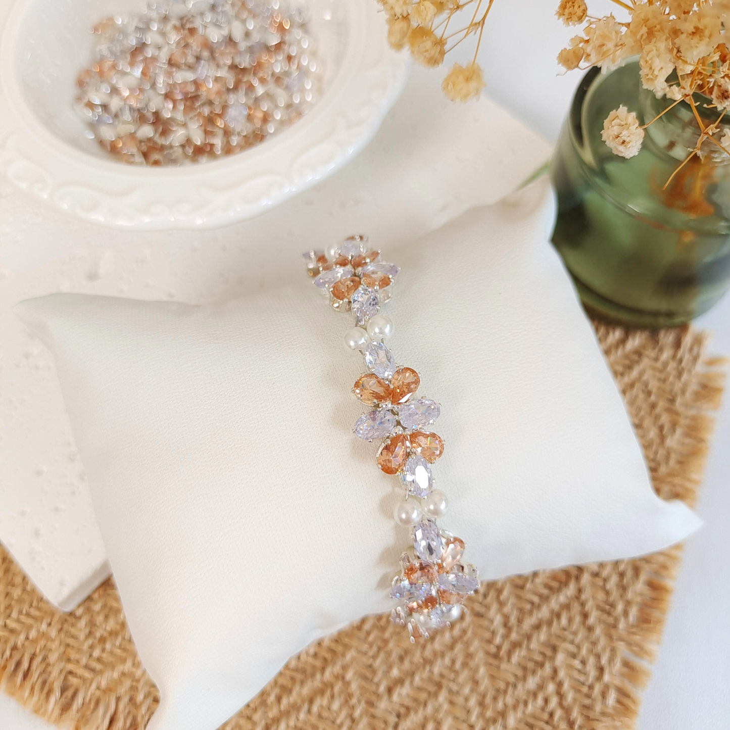 Handmade bracelet with white oval zircon, amber drop zircon, and pearls