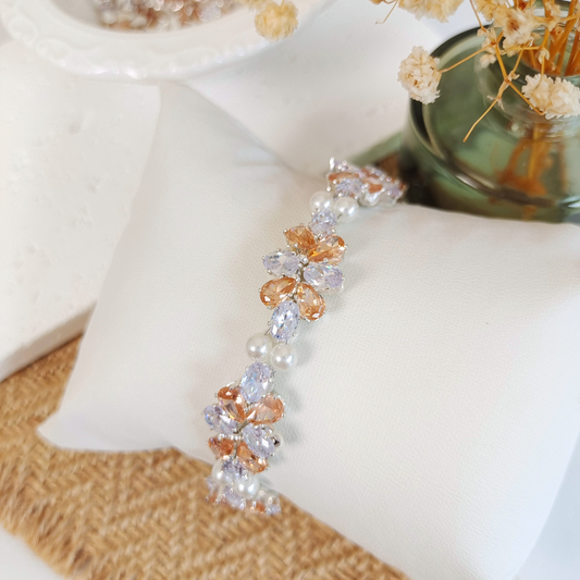 DIY bracelet with white oval and amber teardrop zircon beads + pearls