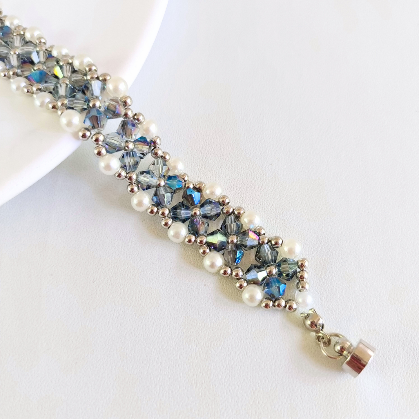 Detailed view of smoky blue beaded bracelet