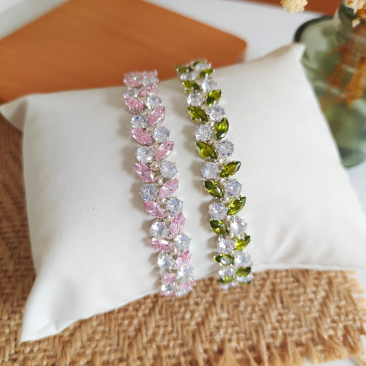 Handmade bracelet with olive branch design and claw-set zircon stones