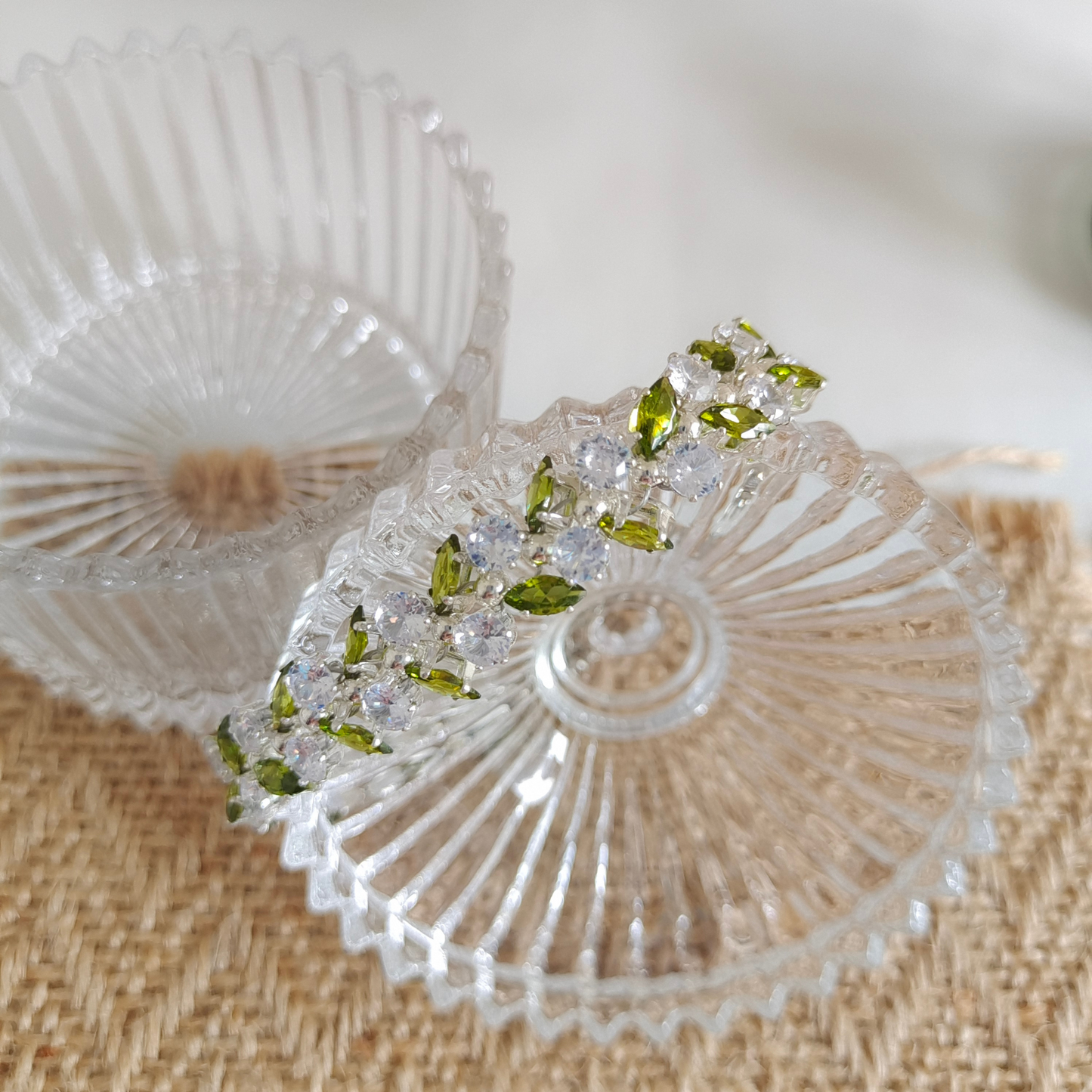Olive leaf design bracelet with claw-set zirconia