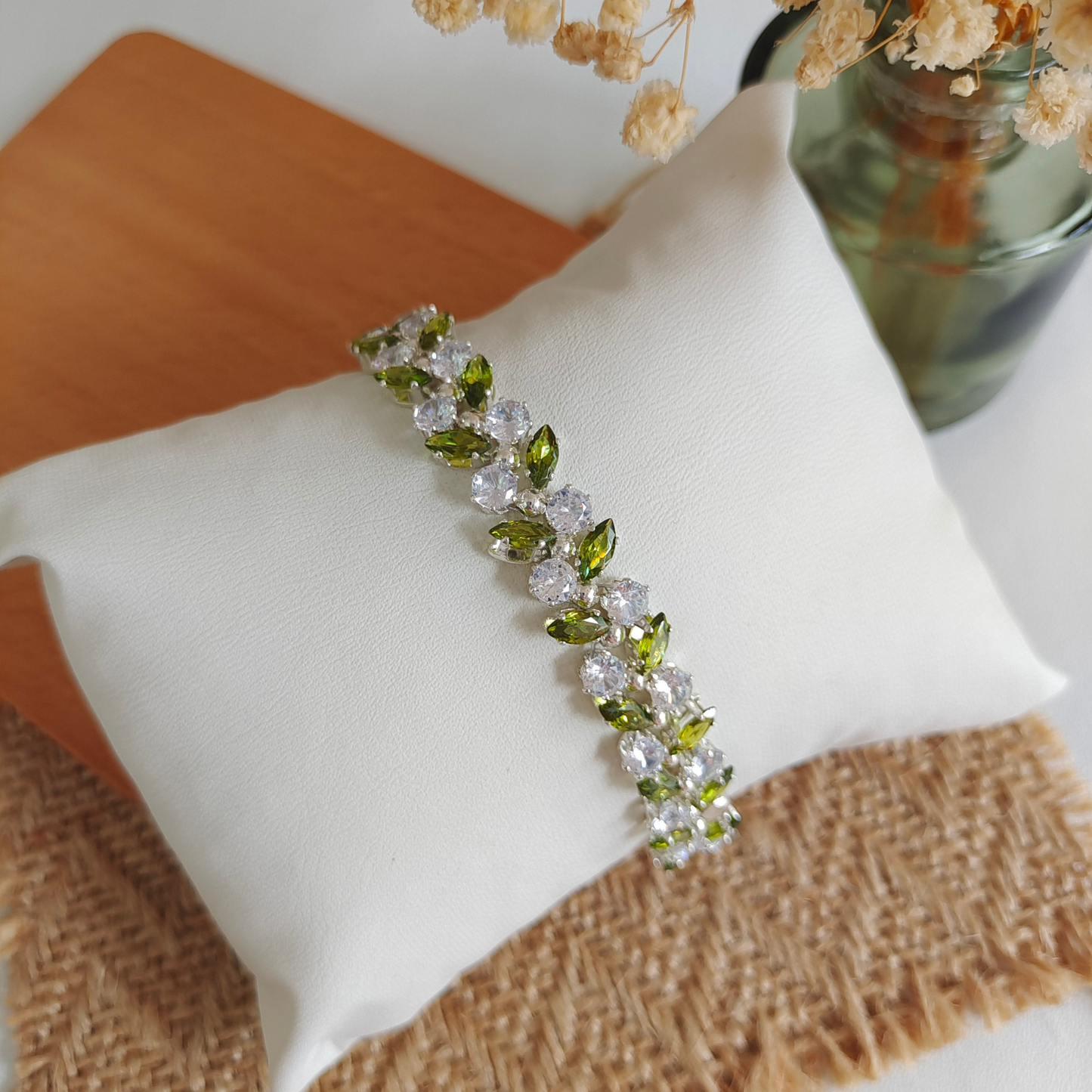 Olive leaf design charm bracelet with cubic zirconia accents