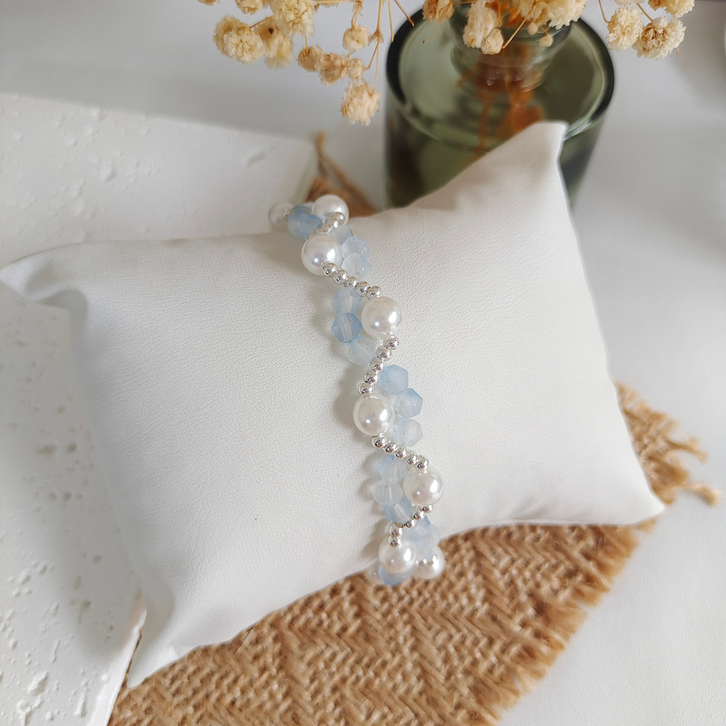 Delicate wave-inspired bracelet with matte cream beads and big pearls