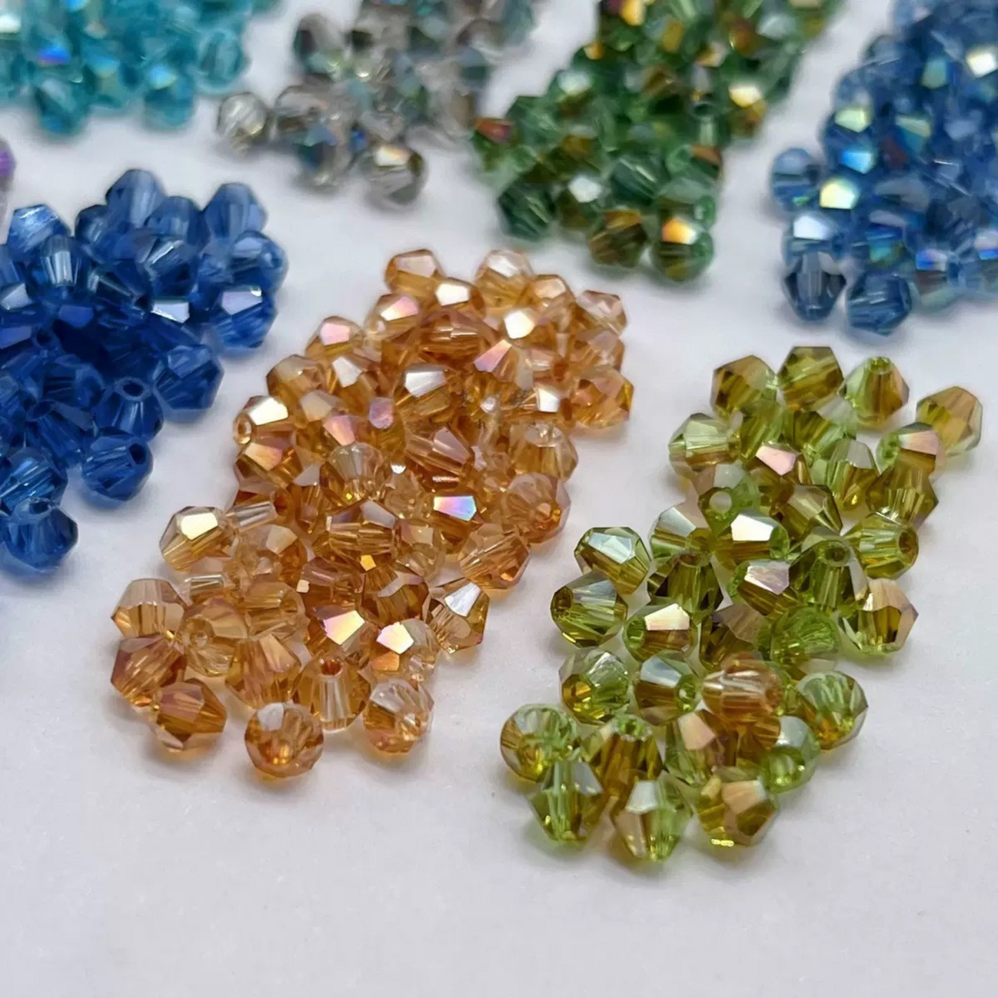Detailed view of AB coated faceted crystal bead in diamond cut