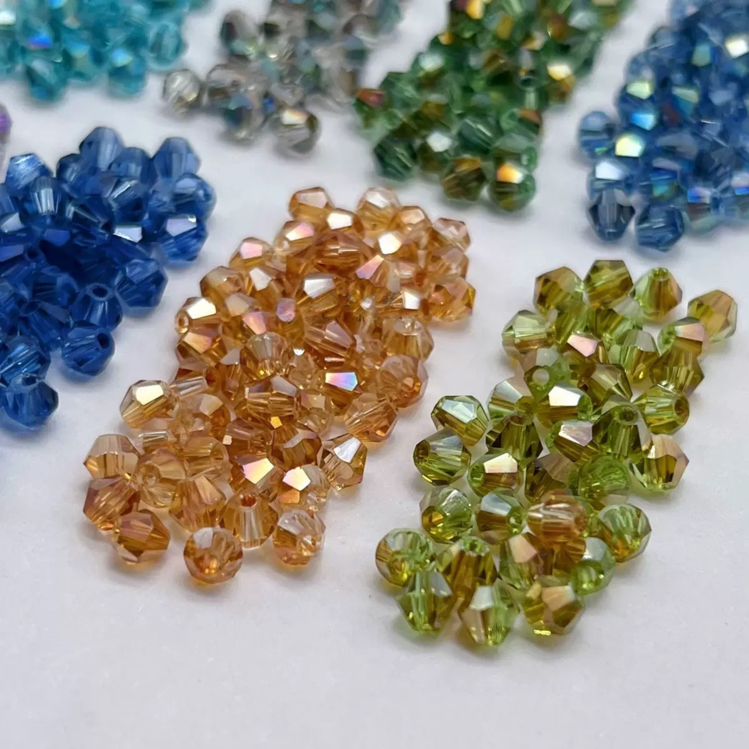 Detailed view of AB coated faceted crystal bead in diamond cut