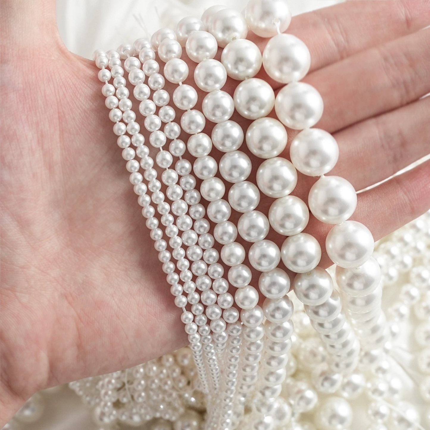 Glossy round pearls with smooth surface for handmade jewelry