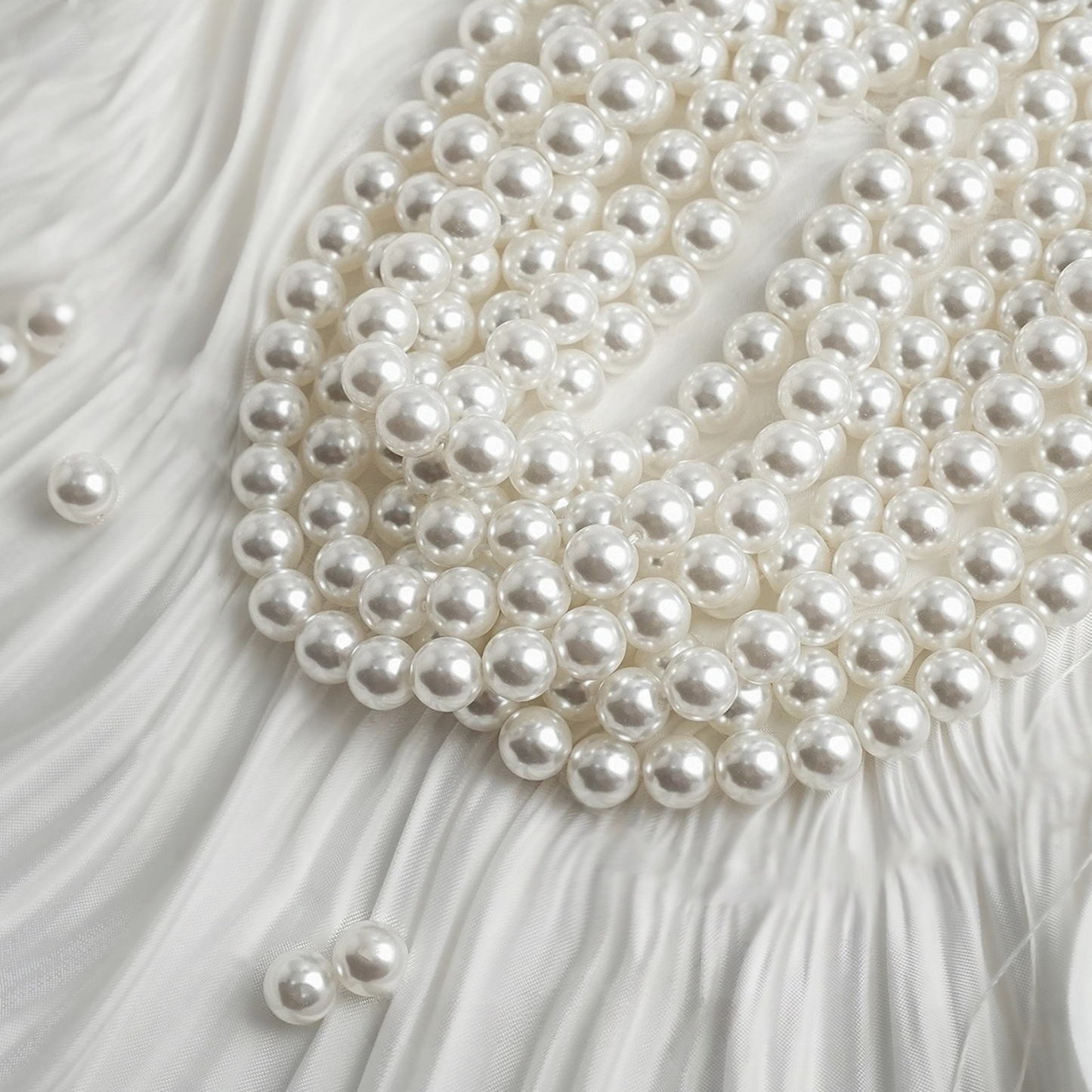 Close-up of round faux pearls resembling Swarovski quality