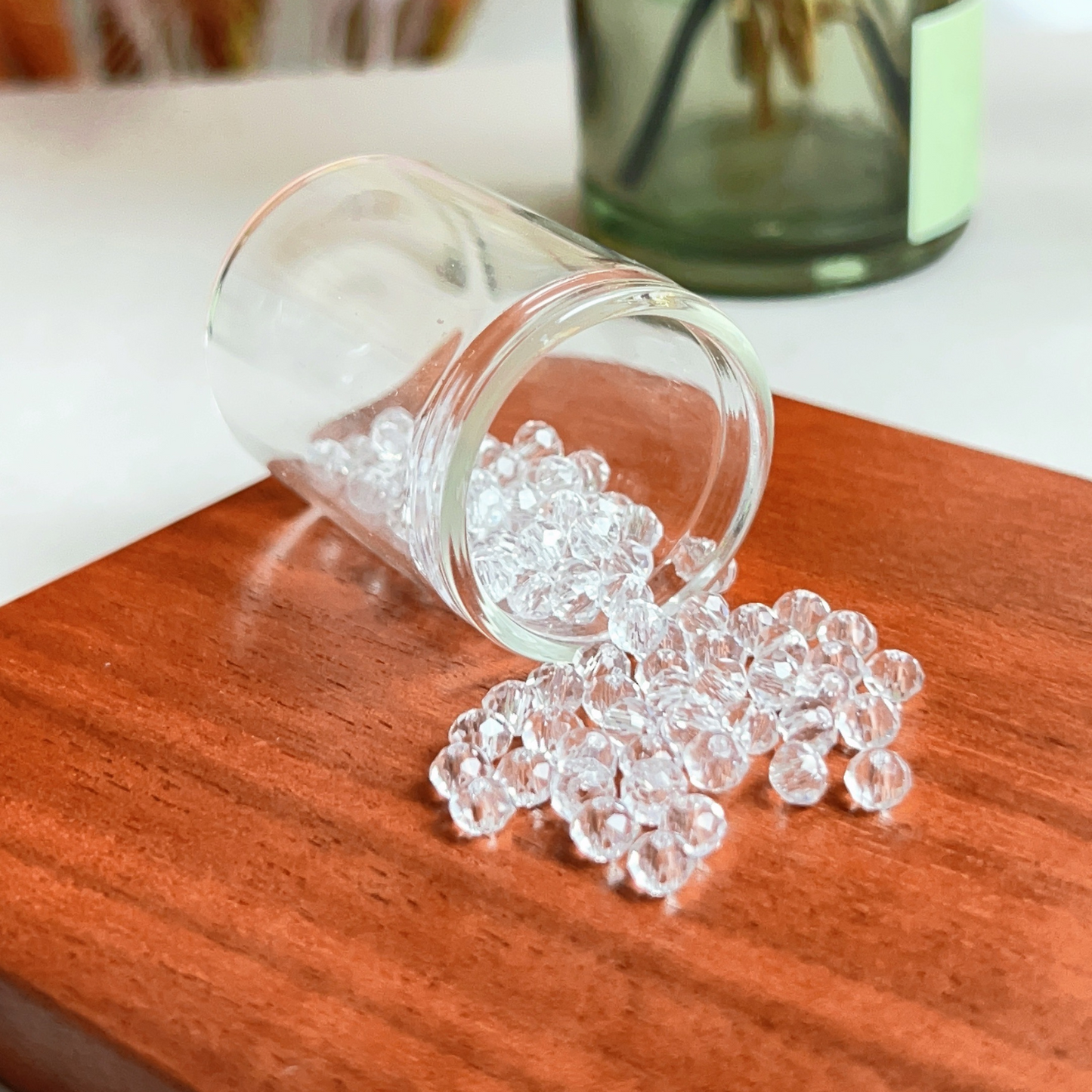 Glass Bottle of Clear Bocone Beads