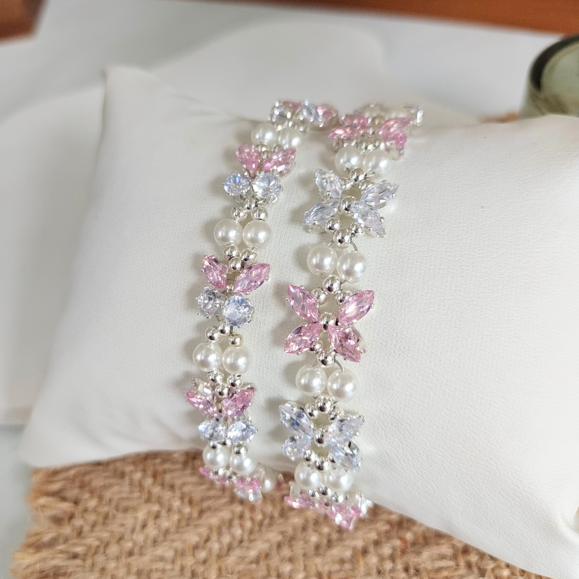 Elegant pink and transparent CZ bracelet with gold claw settings