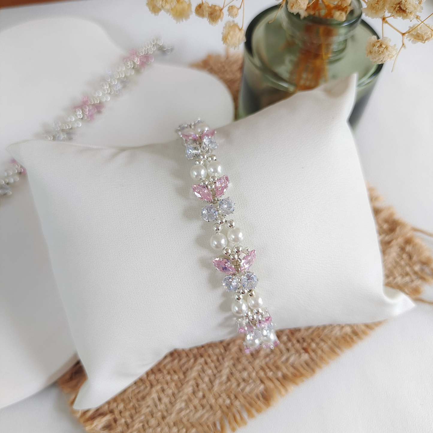 Beaded bracelet featuring pink and crystal-clear cubic zirconia